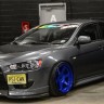 Спойлер переднего бампера (под клыки) для Mitsubishi Lancer X купить недорого с доставкой в Томилино